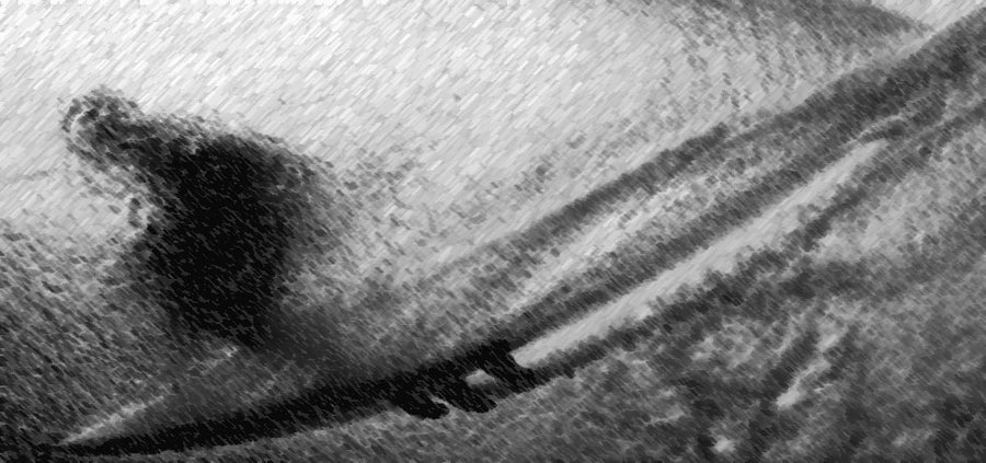 Surfer leaning on the rail in the wave face