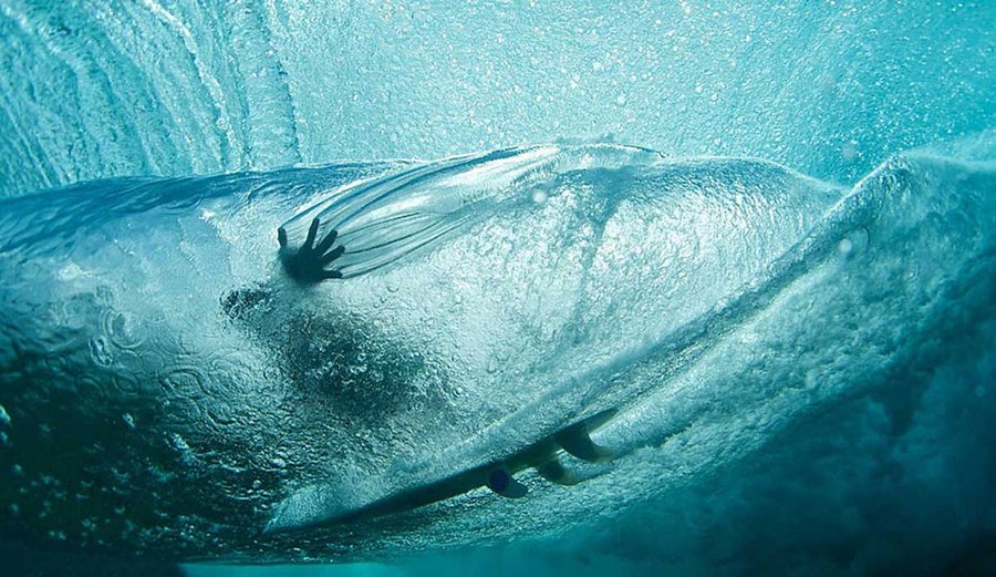 Underwater view of a thruster in a turn, all three fins immersed